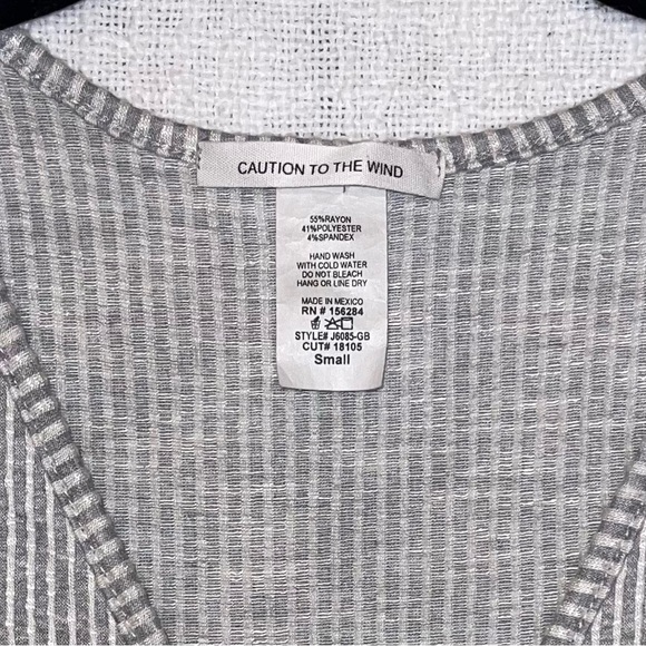 CAUTION TO THE WIND women’s striped faux wrap peplum long sleeve top Sz S - Picture 2 of 4